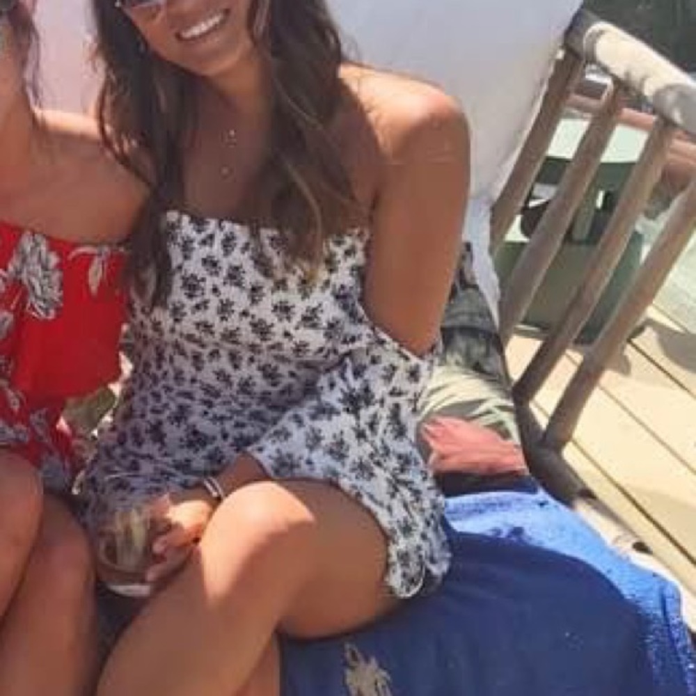 Planet blue off the shoulder romper. White and black.